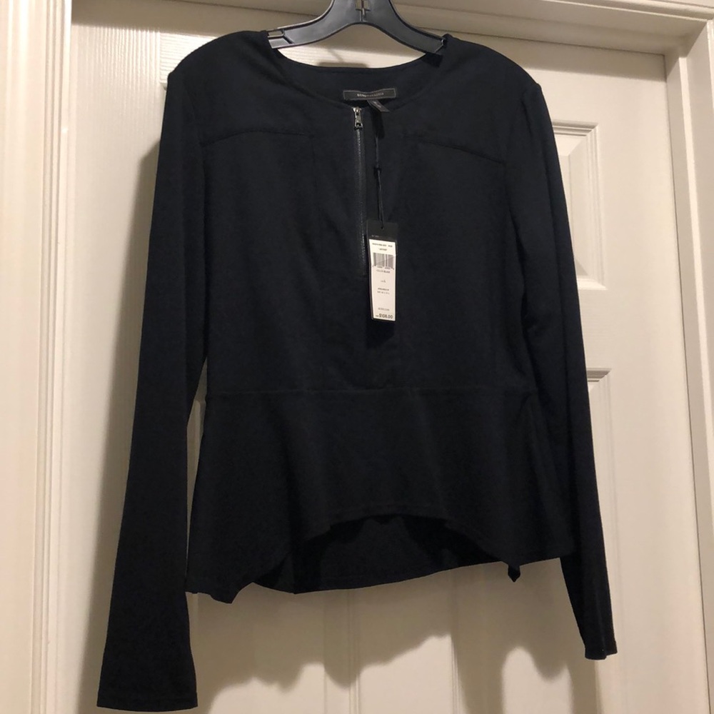 Peplum black long sleeve top